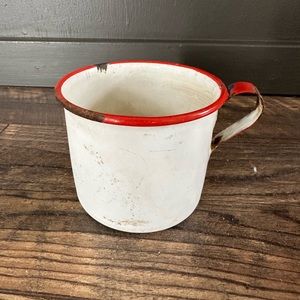 Vintage enamelware red and white cup